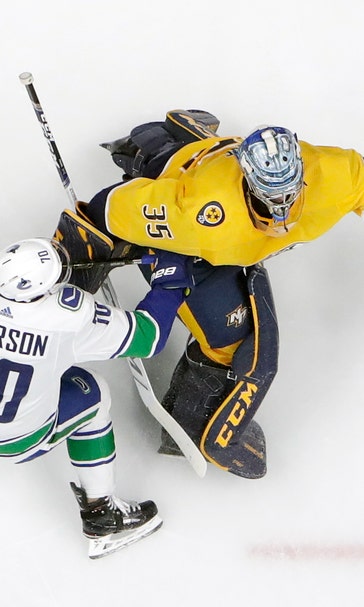 Predators rally with 2 late goals, beat Canucks 3-2